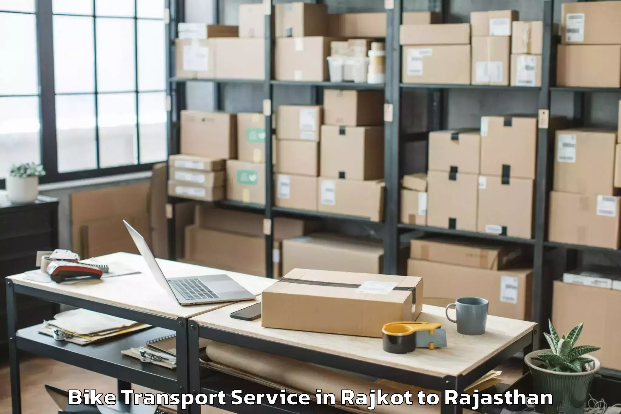 Professional Rajkot to World Trade Park Mall Jaipur Bike Transport